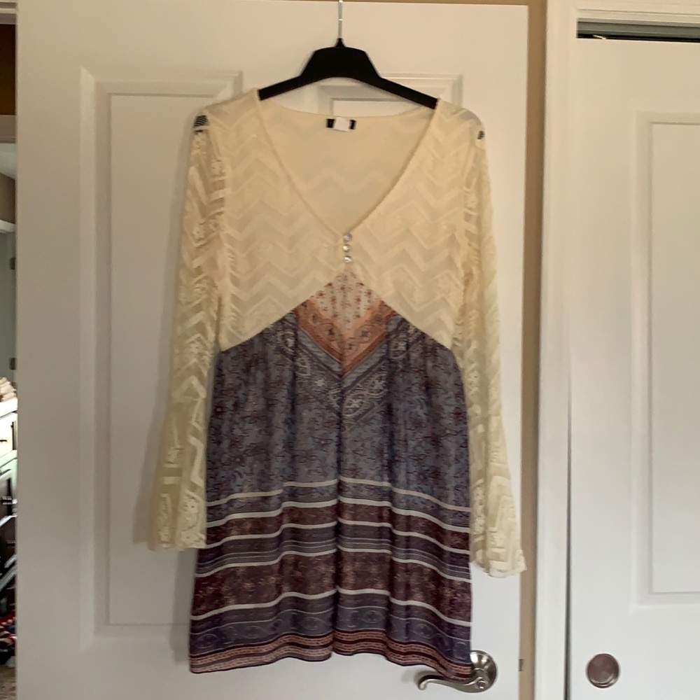 Venus crocheted flared sleeved dress.